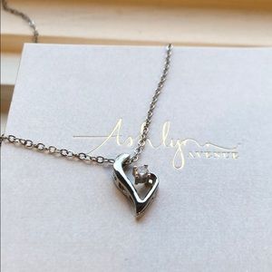Ashlynn Avenue half heart necklace